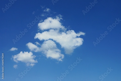 white clouds on blue sky on a sunny day
