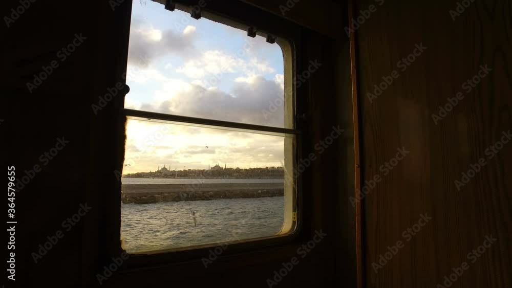 Steamboat from window istanbul bosphorus. ıstanbul Classic steamboat evening landscape. enyoj trip in istanbul Steamboat from window istanbul bosphorus. ıstanbul Classic steamboat evening landscape. enyoj trip in istanbul