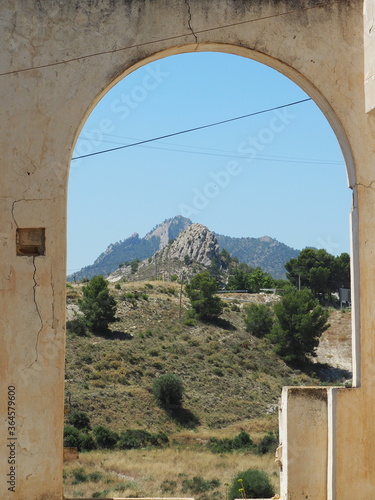 Montaña en paisaje mediterraneo enmarcada con arco, Provincia de Alicante | Mountain in mediterranean landscape  photo