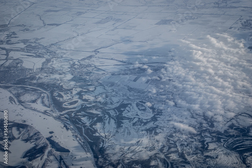 Aerial view of the snow covered mountains
