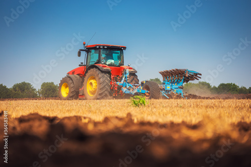 Tractor plowing the fields