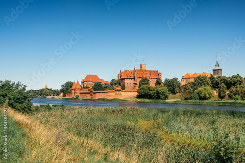 Teutonic Castle in Malbork or Marienburg at summer in Poland