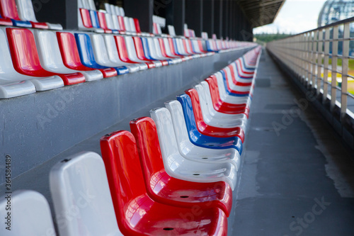 Empty spectator stands, empty chairs