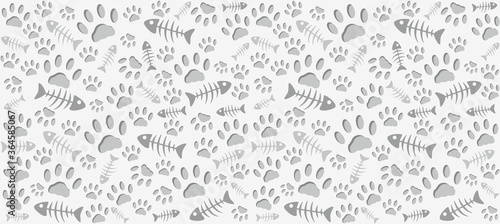Volumetric prints of cat's paws and skeletons of gray fish on a light gray background. Warm endless seamless vector pattern of cat tracks. Pads and fish bones