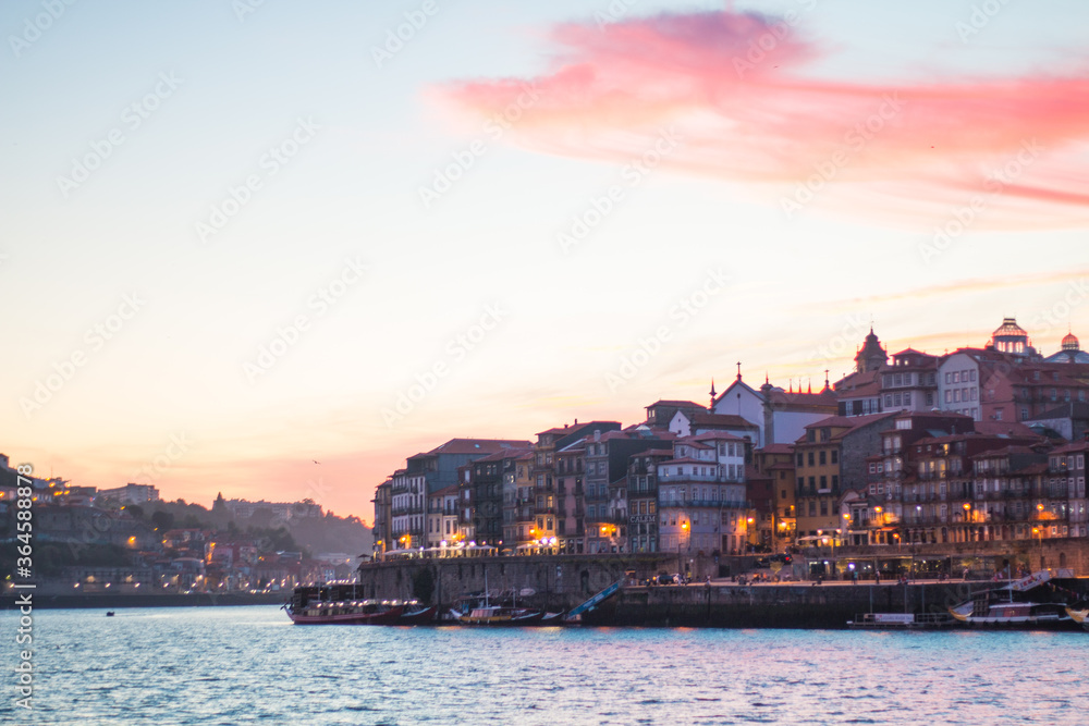 Porto or Oporto  is the second-largest city in Portugal and one of the Iberian Peninsula's major urban areas. Porto is famous for  Houses of Ribeira Square located in the historical center of Porto