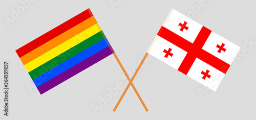 Crossed flags of LGBT and Georgia