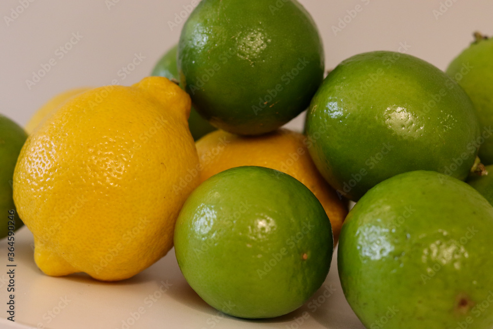 Beautiful lemons arranged on a table. A fruit rich in vitamin c. Beautiful lemons arranged on a table. A fruit rich in vitamin c.