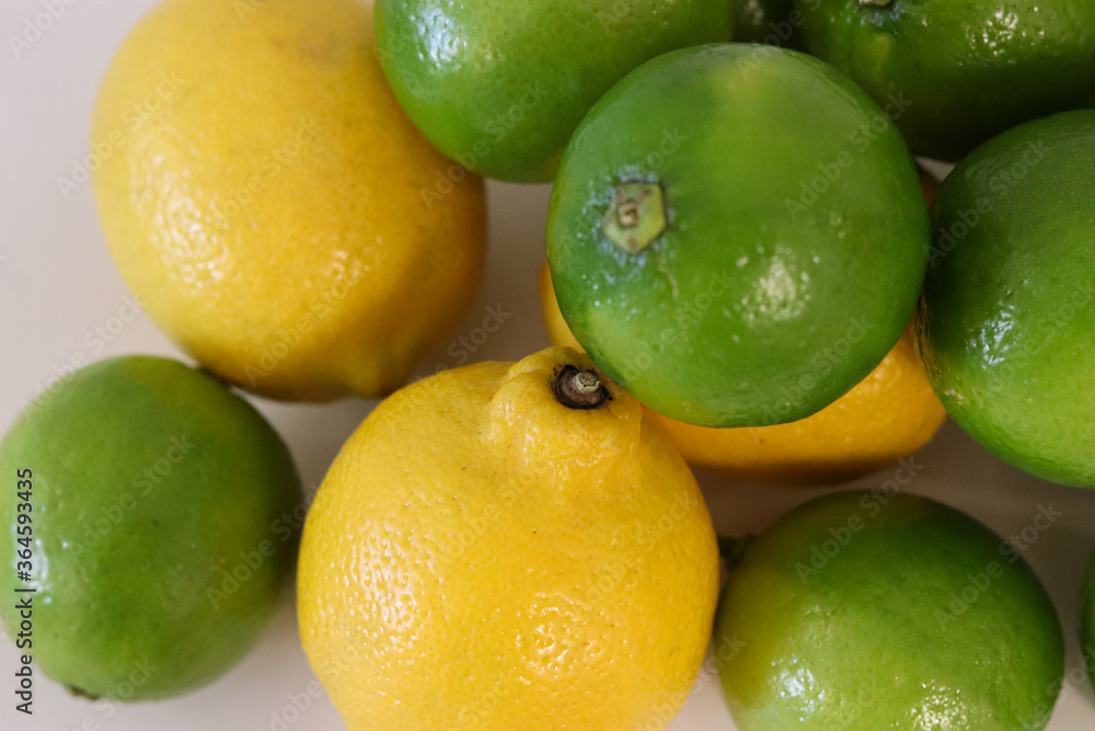 Beautiful lemons arranged on a table. A fruit rich in vitamin c. Beautiful lemons arranged on a table. A fruit rich in vitamin c.