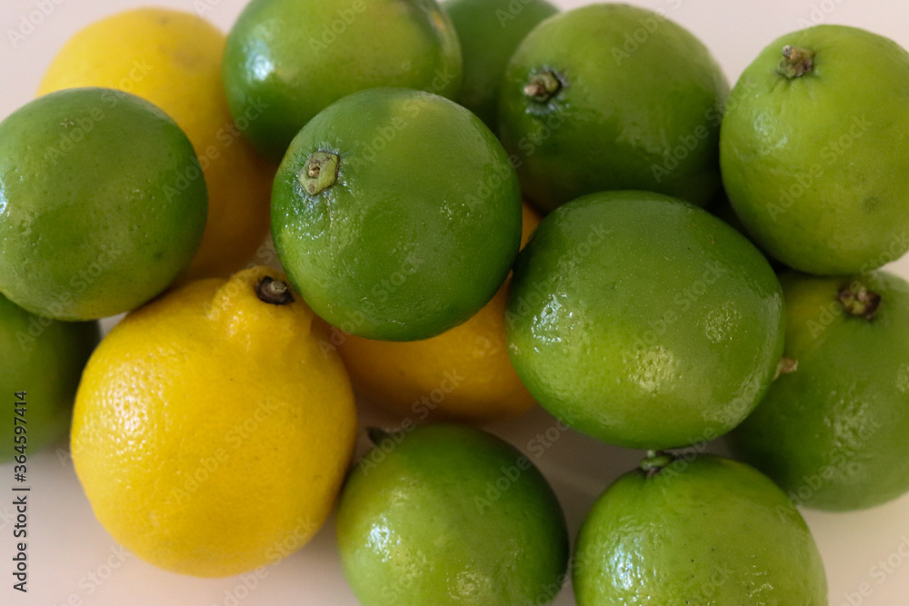 Beautiful lemons arranged on a table. A fruit rich in vitamin c. Beautiful lemons arranged on a table. A fruit rich in vitamin c.