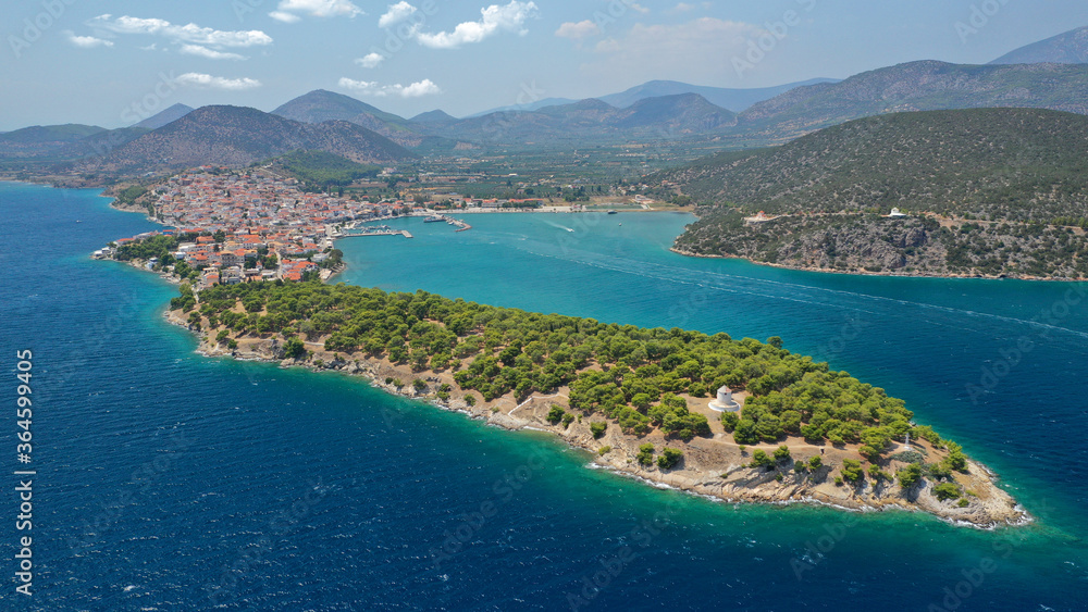 Aerial drone photo of picturesque city of Ermioni built in peninsula with forest of Bistis at the end, Argolida, Peloponnese, Greece Aerial drone photo of picturesque city of Ermioni built in peninsula with forest of Bistis at the end, Argolida, Peloponnese, Greece