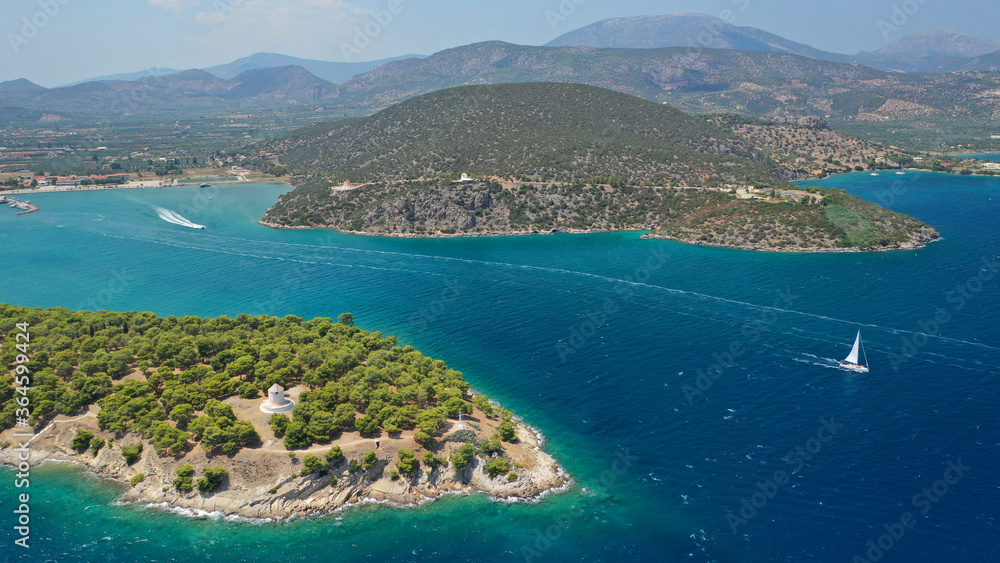 Aerial drone photo of picturesque city of Ermioni built in peninsula with forest of Bistis at the end, Argolida, Peloponnese, Greece