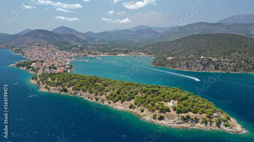 Aerial drone photo of picturesque city of Ermioni built in peninsula with forest of Bistis at the end, Argolida, Peloponnese, Greece © aerial-drone