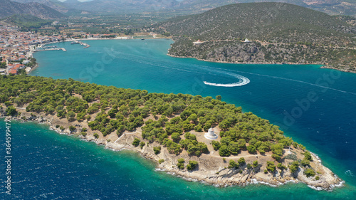 Aerial drone photo of picturesque city of Ermioni built in peninsula with forest of Bistis at the end, Argolida, Peloponnese, Greece photo