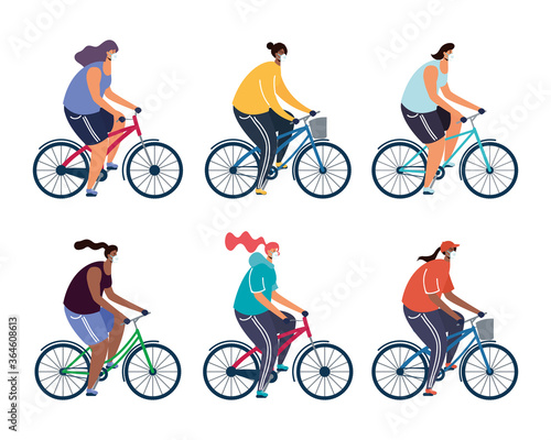 young people riding bicycle wearing medical masks