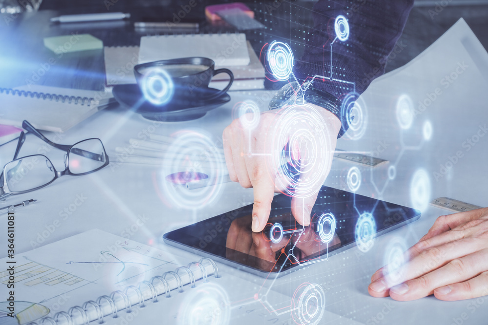 Double exposure of man's hand holding and using a digital device and data theme drawing. Technology concept. Double exposure of man's hand holding and using a digital device and data theme drawing. Technology concept.