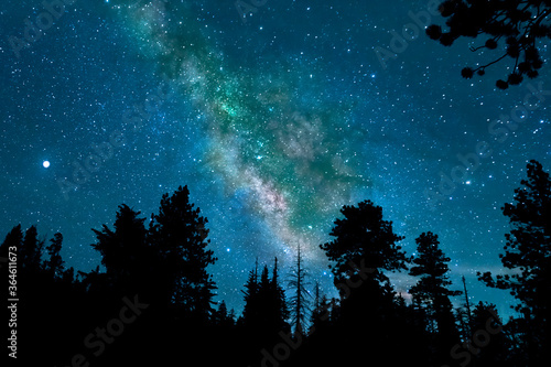 Scenic night sky photography of the Milky Way and Stars while backpacking and camping outdoors at Crocker Point, Yosemite National Park in California