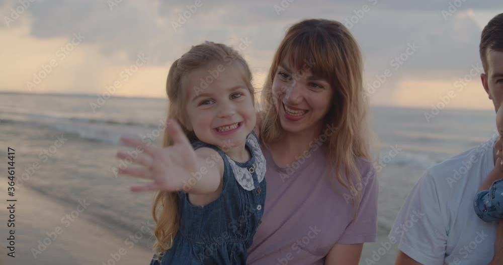 Young mother and her little daughter have fun at the beach Young mother and her little daughter have fun at the beach
