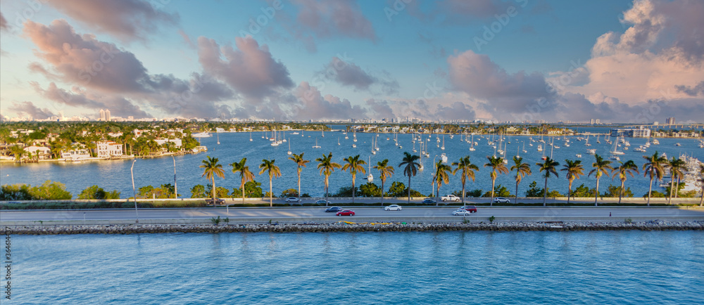 Fototapeta premium Sailboats Past Causeway Past Causeway and Harbor