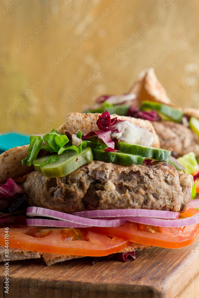 Hamburger made with lamb meat. Lamb burger. Classic traditional greek ... Hamburger made with lamb meat. Lamb burger. Classic traditional greek ...