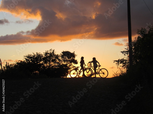 Martinópole, Ceará/Brazil - 24/05/2020: Cyclist Silhouette at Sunset