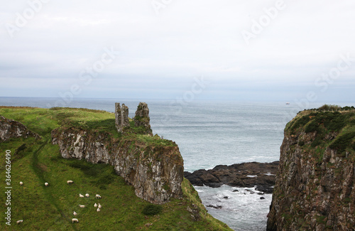 Beautiful coastline of Northern Ireland, featuring clifs, waves and water