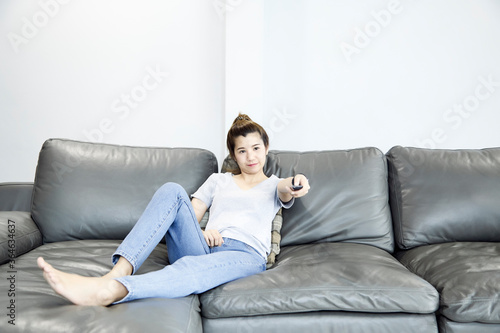 Woman at home watching tv