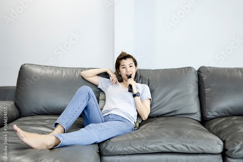 Woman at home watching tv