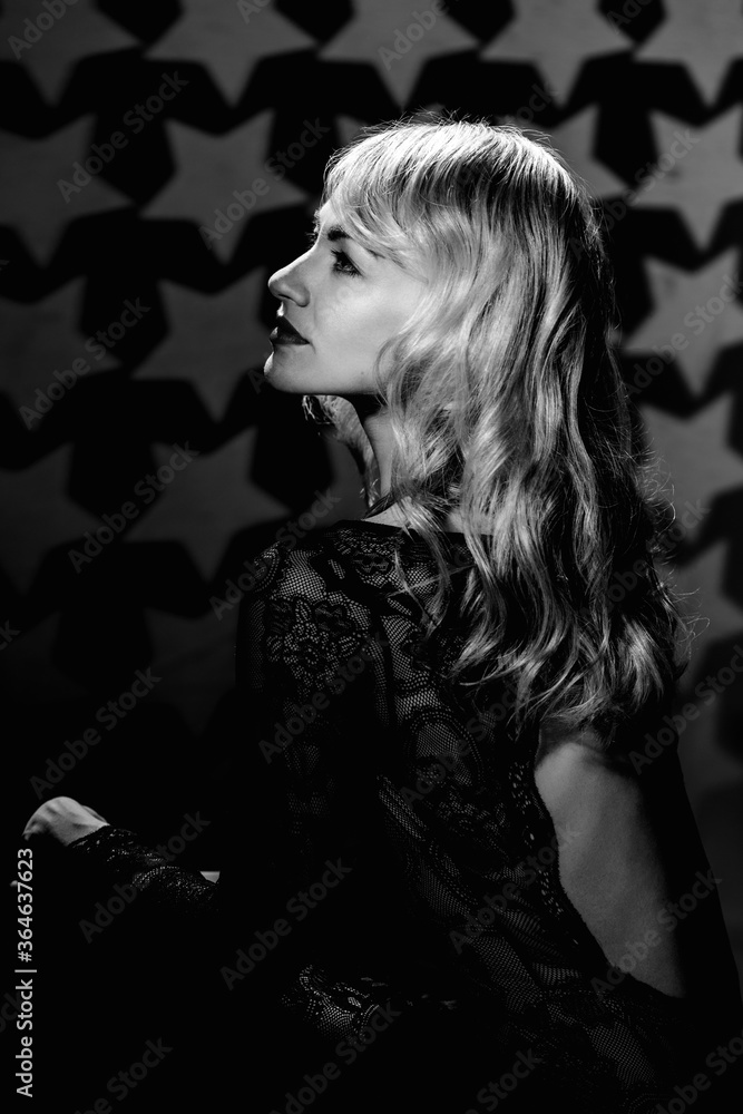 Black and white portrait of beautiful blonde woman posing on Hollywood background Black and white portrait of beautiful blonde woman posing on Hollywood background