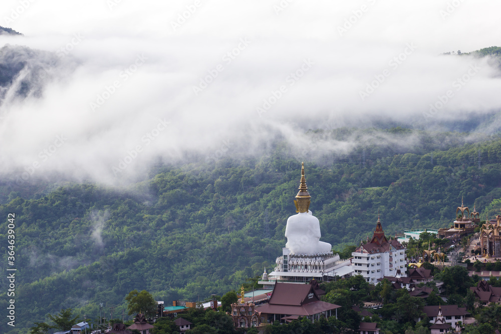 buddhist temple in fog