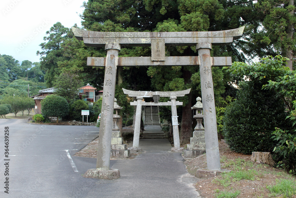 The gate of Ikime Jinja, a Japanese shrine in the outskirt of Beppu, Japan The gate of Ikime Jinja, a Japanese shrine in the outskirt of Beppu, Japan