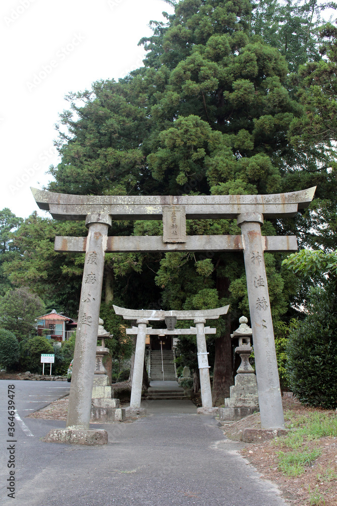 The gate of Ikime Jinja, a Japanese shrine in the outskirt of Beppu, Japan The gate of Ikime Jinja, a Japanese shrine in the outskirt of Beppu, Japan