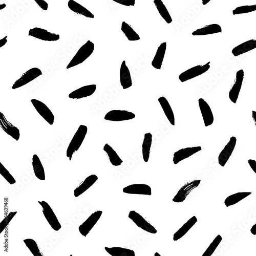 Brush strokes vector seamless pattern. Black paint freehand scribbles  dash lines  dry texture. Chaotic rough smears. Black and white mosaic texture. Hand drawn grunge ink brushstrokes.