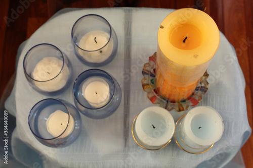 Candles arranged in front of altar for taize meditation in a Salesian Catholic chapel