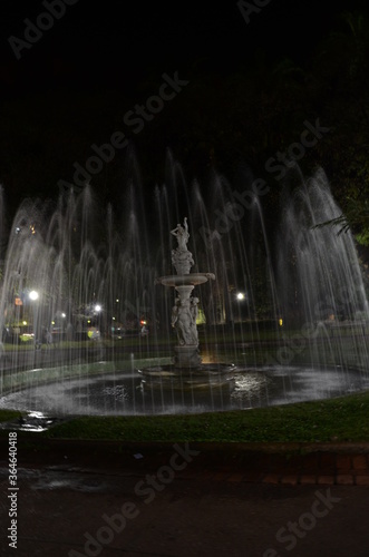 Praça da Liberdade (translated as Liberty Square) at Belo Horizonte in the state of Minas Gerais in Brazil at night with water fountain on