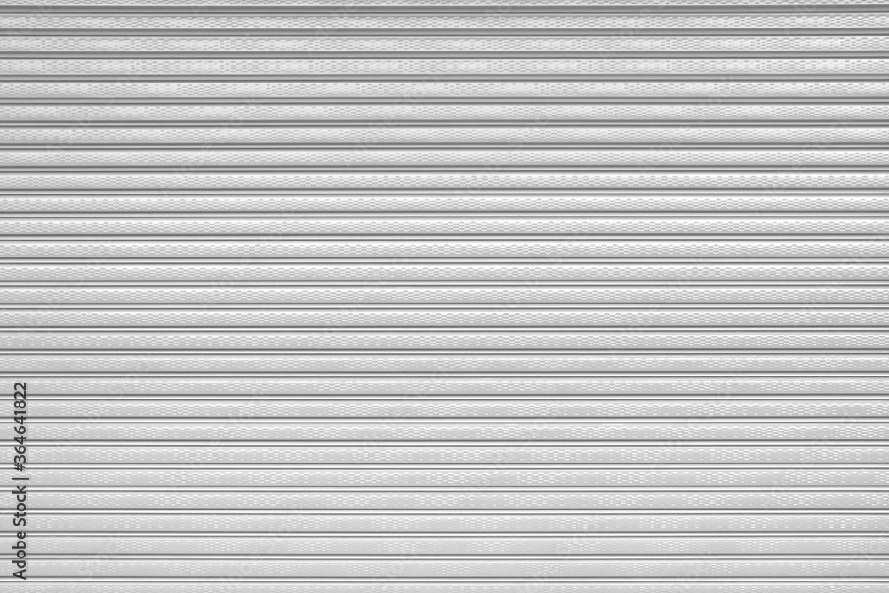 Grey roller shutter door texture background, corrugated metal sheet, Slide door Grey roller shutter door texture background, corrugated metal sheet, Slide door