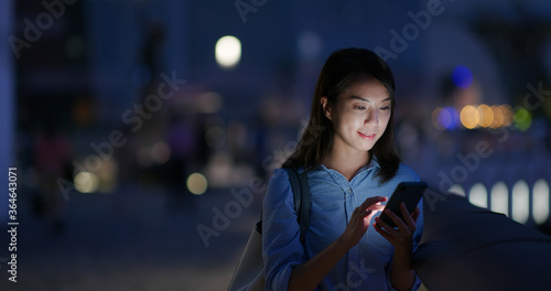 Photography Woman use of mobile phone at outdoor