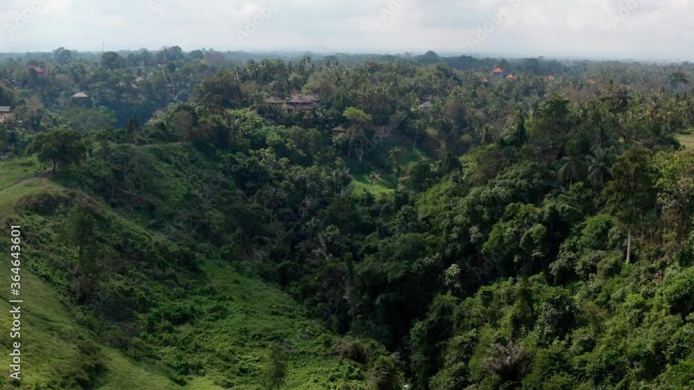 Aerial cinematic drone view surrounded by rice fields and nature. Ubud, Bali, Indonesia Aerial cinematic drone view surrounded by rice fields and nature. Ubud, Bali, Indonesia