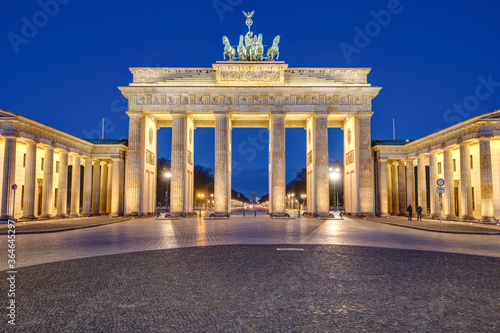 The famous illuminated Brandenburg Gate in Berlin at dawn with no people