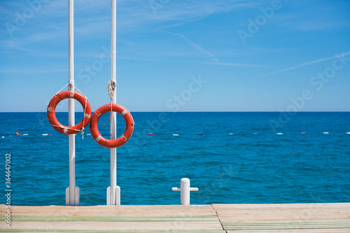 Lifebuoys on the background of the sea