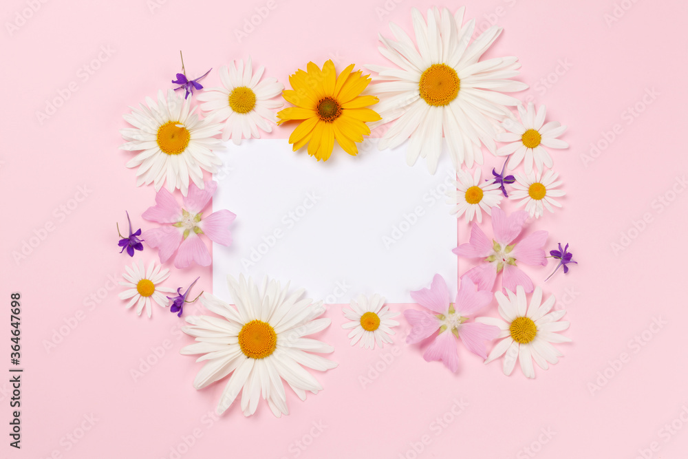 Garden flowers frame over pink