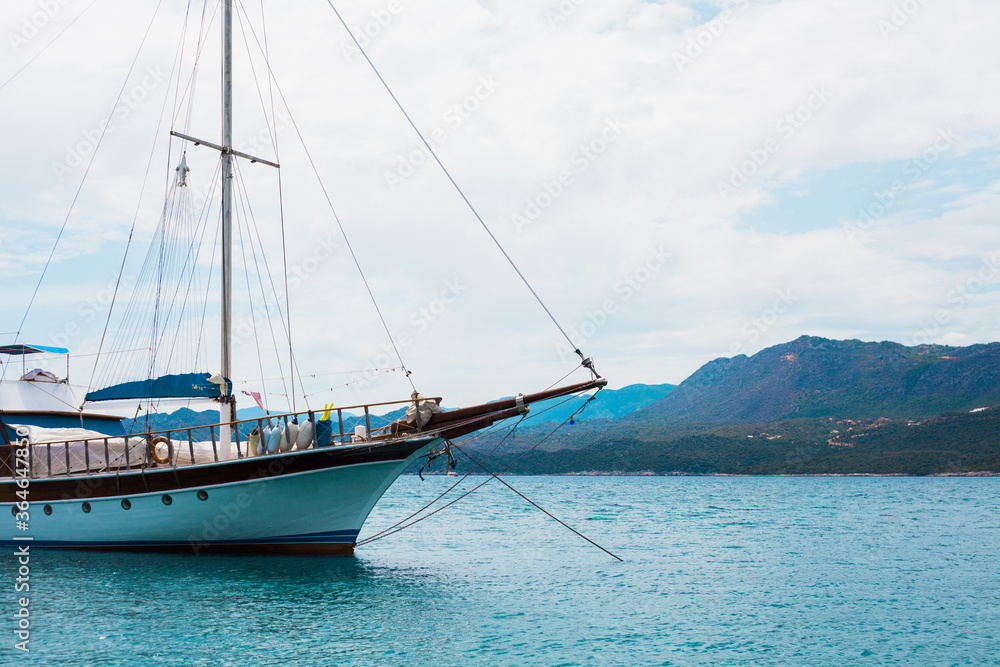 Fototapeta premium Pier on the shore of the blue sea