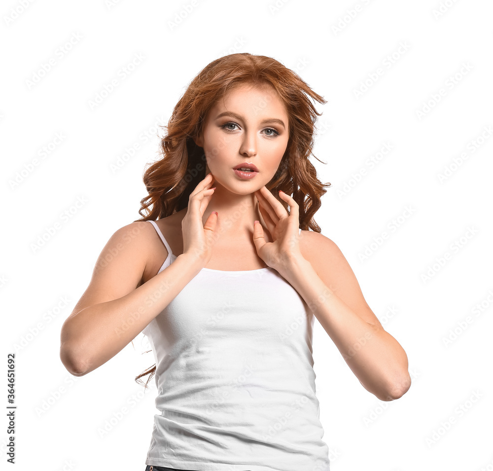 Beautiful young redhead woman on white background Beautiful young redhead woman on white background