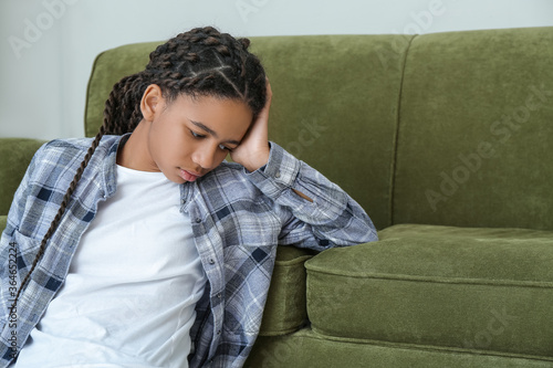 Sad African-American girl a...