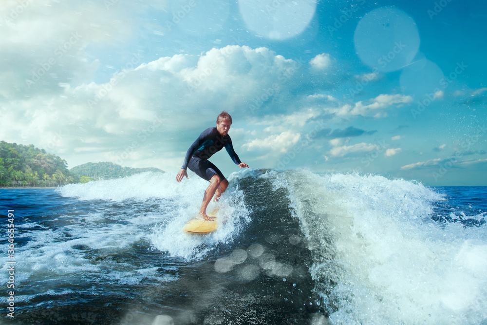 Surfer on Blue Ocean Wave Getting Barreled. Surfer on Blue Ocean Wave Getting Barreled.