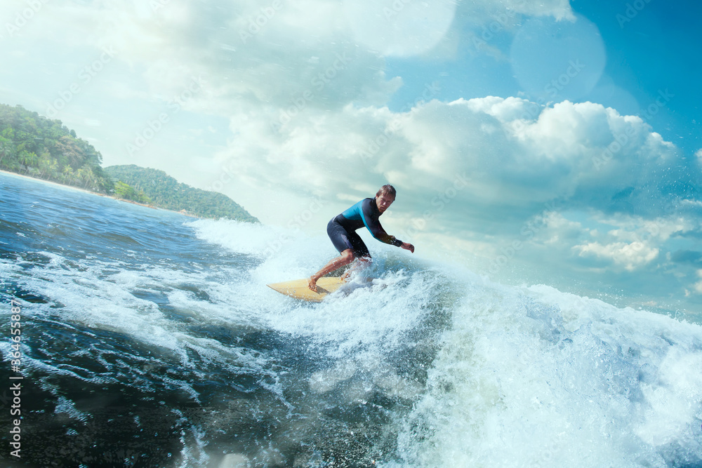 Surfer on Blue Ocean Wave Getting Barreled. Surfer on Blue Ocean Wave Getting Barreled.