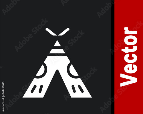 White Traditional indian teepee or wigwam icon isolated on black background. Indian tent. Vector Illustration.