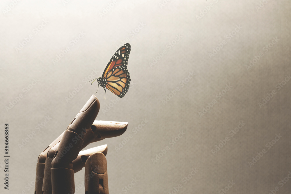 surreal encounter between a wooden hand and a colorful butterfly