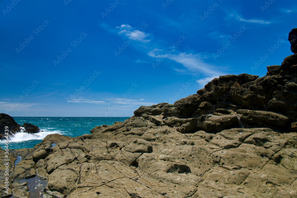 rocks sea and sky