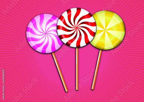 colorful candies  with pink background