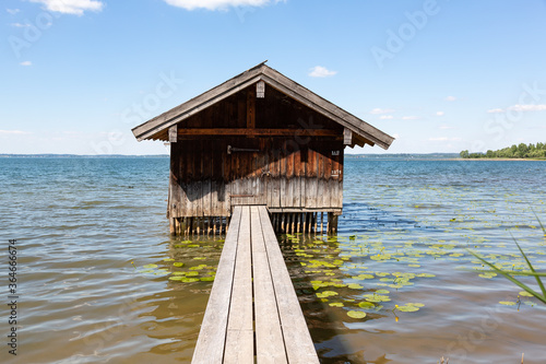 Boathouse on Lake Chiemsee with water level markings of earlier floods